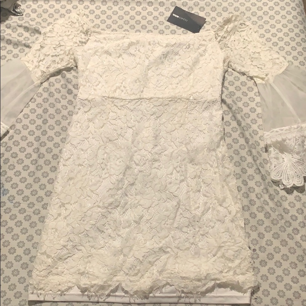 Off the shoulder white lace mini dress